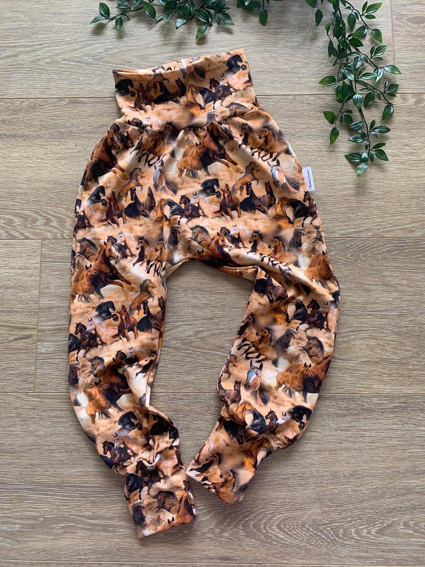 Bukser m/ heste, str 110/116 🐴